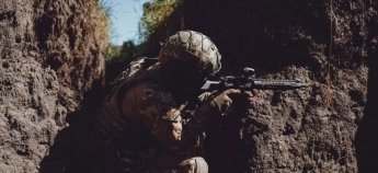 Бійці 57 ОБрМП на лінії фронту