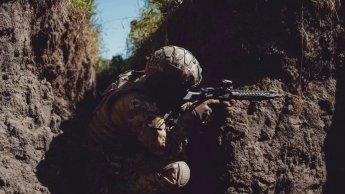 Бійці 57 ОБрМП на лінії фронту